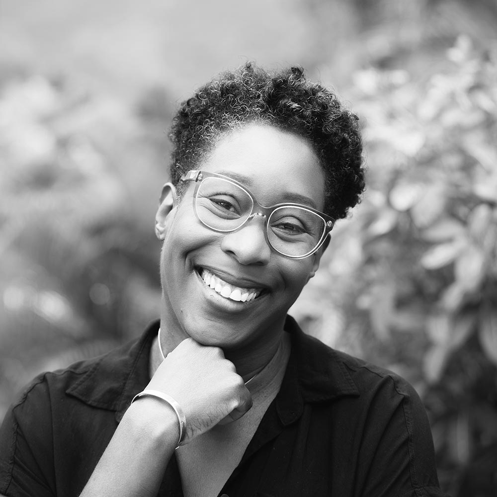 Portrait of Attillah Springer smiling